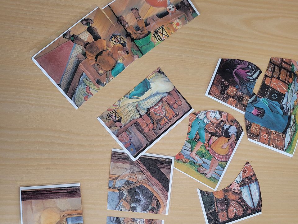 2026_09_20_Kindertag_Hedemünden__4_.jpg Ein Märchen-Puzzlebild auf dem Tisch zum Kindertag in der DRK-Kita
